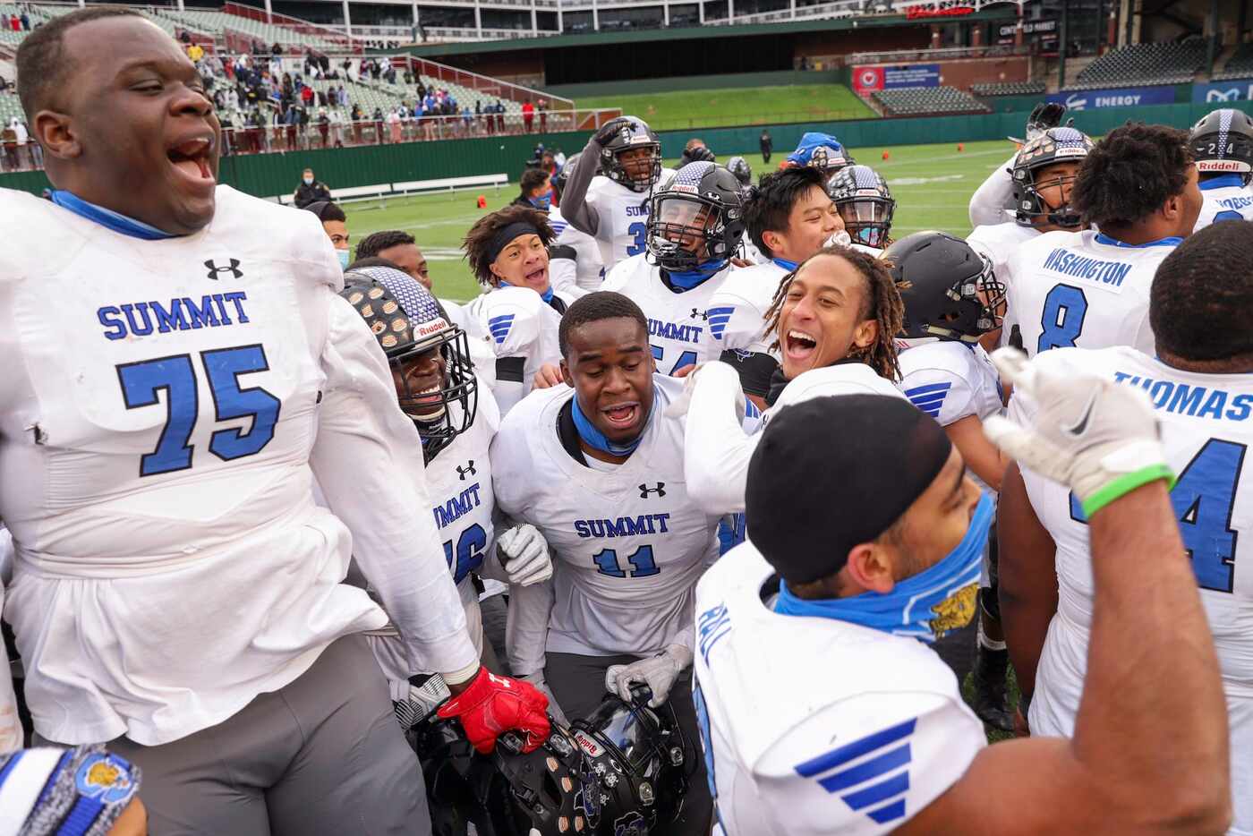 Mansfield Summit players celebrate after their Class 5A Division I Region I final win over...