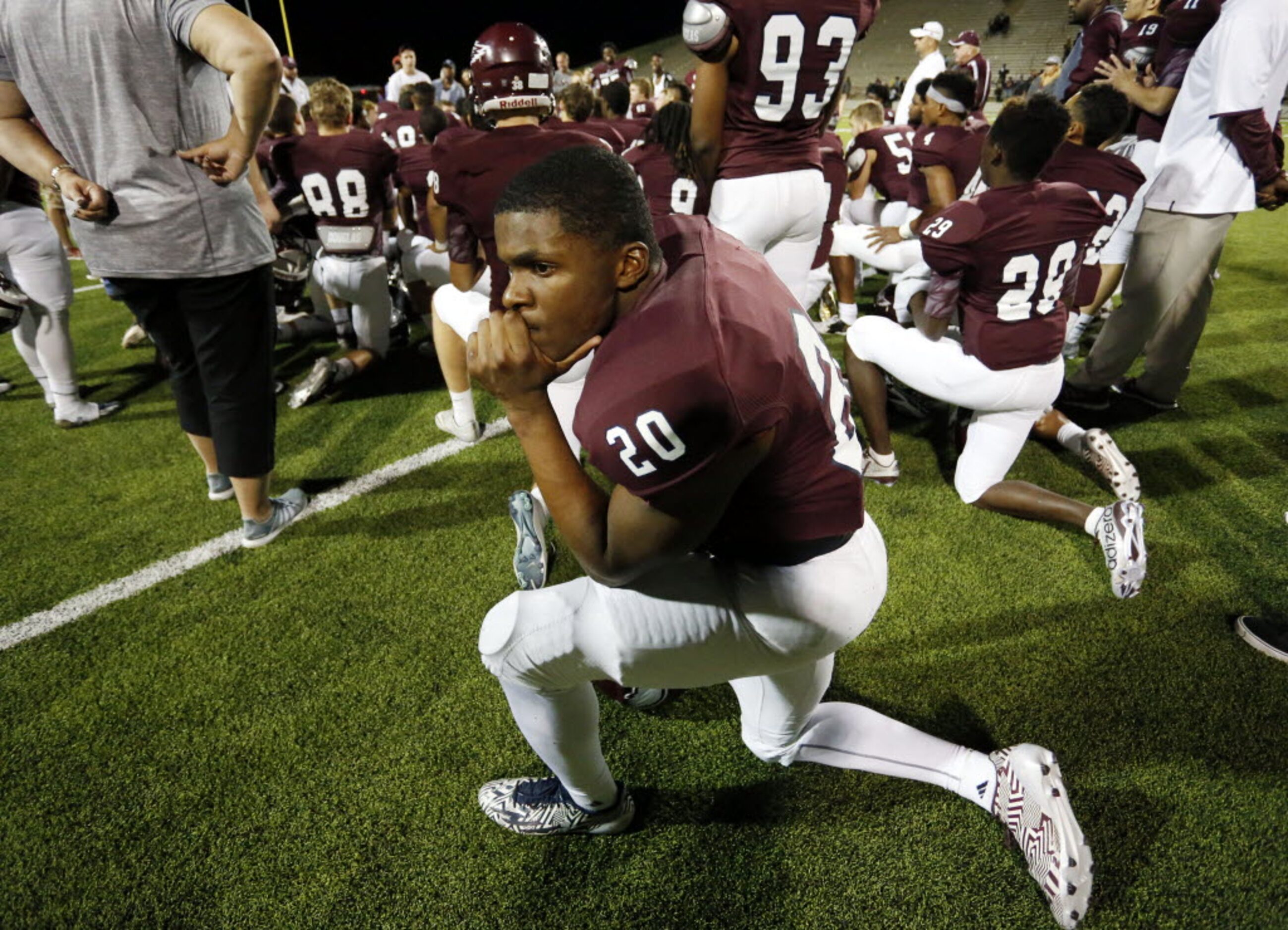 (TXHSFB) Rowlett WR LaDarius Dickens (20) seems deep in though, after the team's 34-28 win...