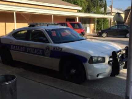  A Dallas Police Department patrol car sits in the Resource Center parking lot on Tuesday,...