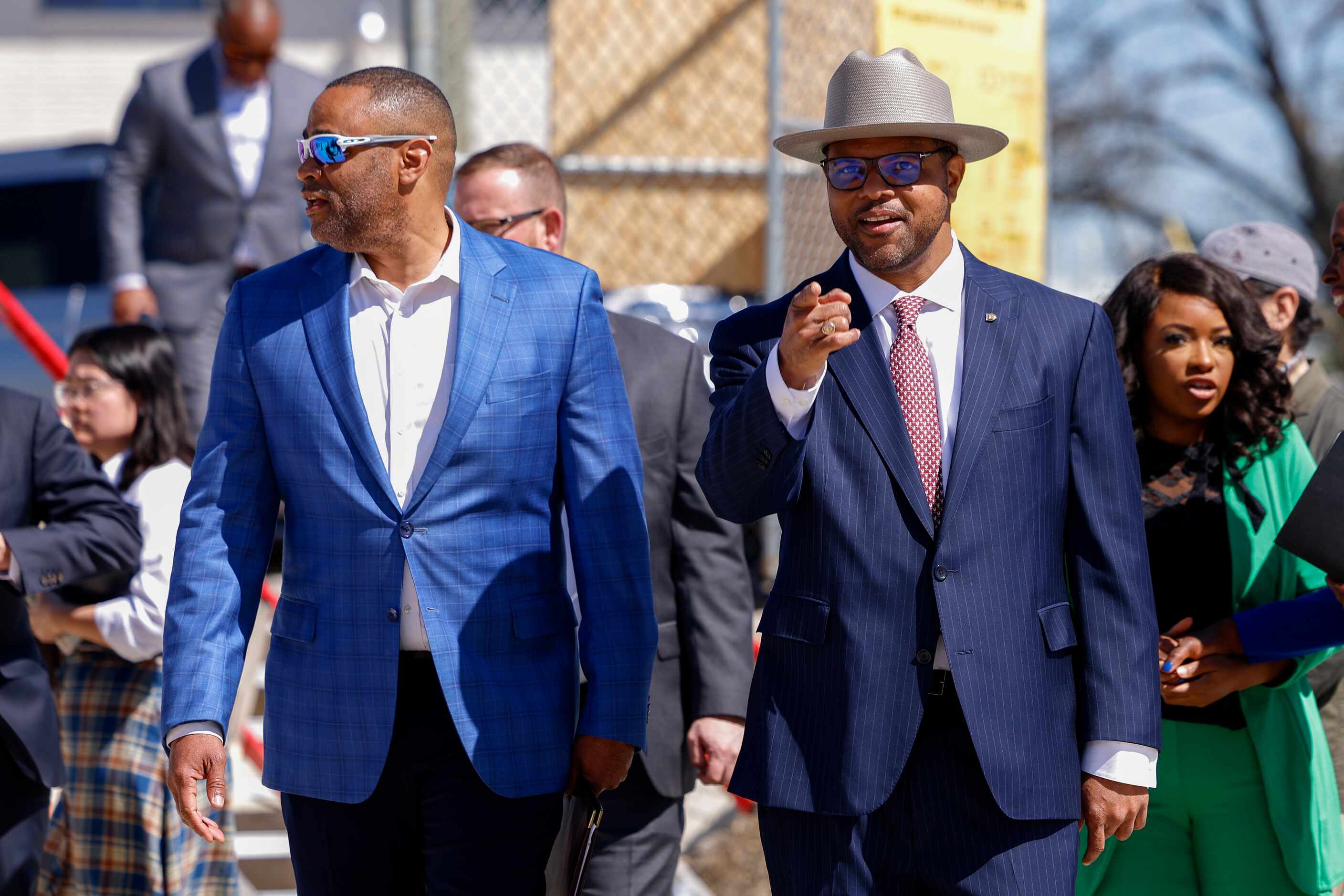 Rep. Marc Veasey (left) walks with Dallas Mayor Eric Johnson before a news conference about...