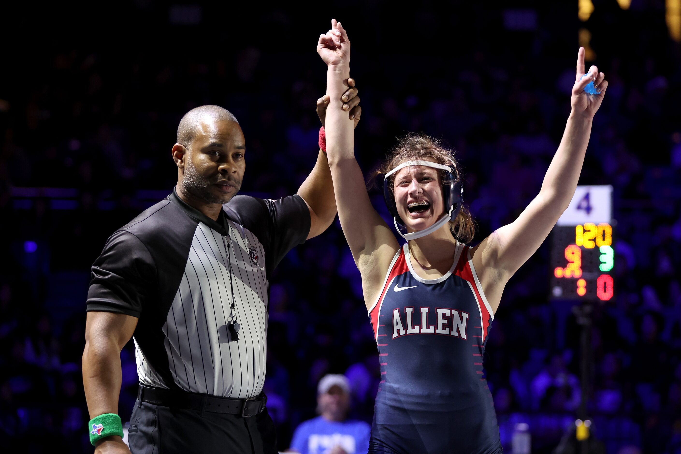 Kailin Sebert of Allen (blue) defeats Brooke McCurley of Round Rock in the Girls 6A...