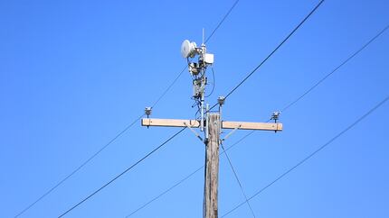 Instead of laying fiber, AT&T could use plastic antennas placed along power lines to deliver...