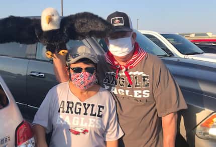 Argyle fans Gene Tulley and his wife, Connie. Their grandson, Ethan Gonzales, is a senior...