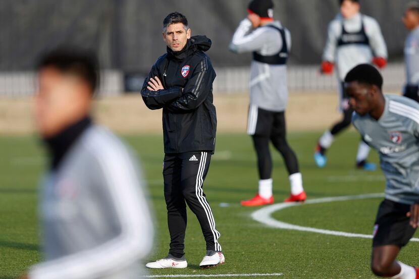 FC Dallas head coach Luchi Gonzalez looks on during the first day of training camp at Toyota...