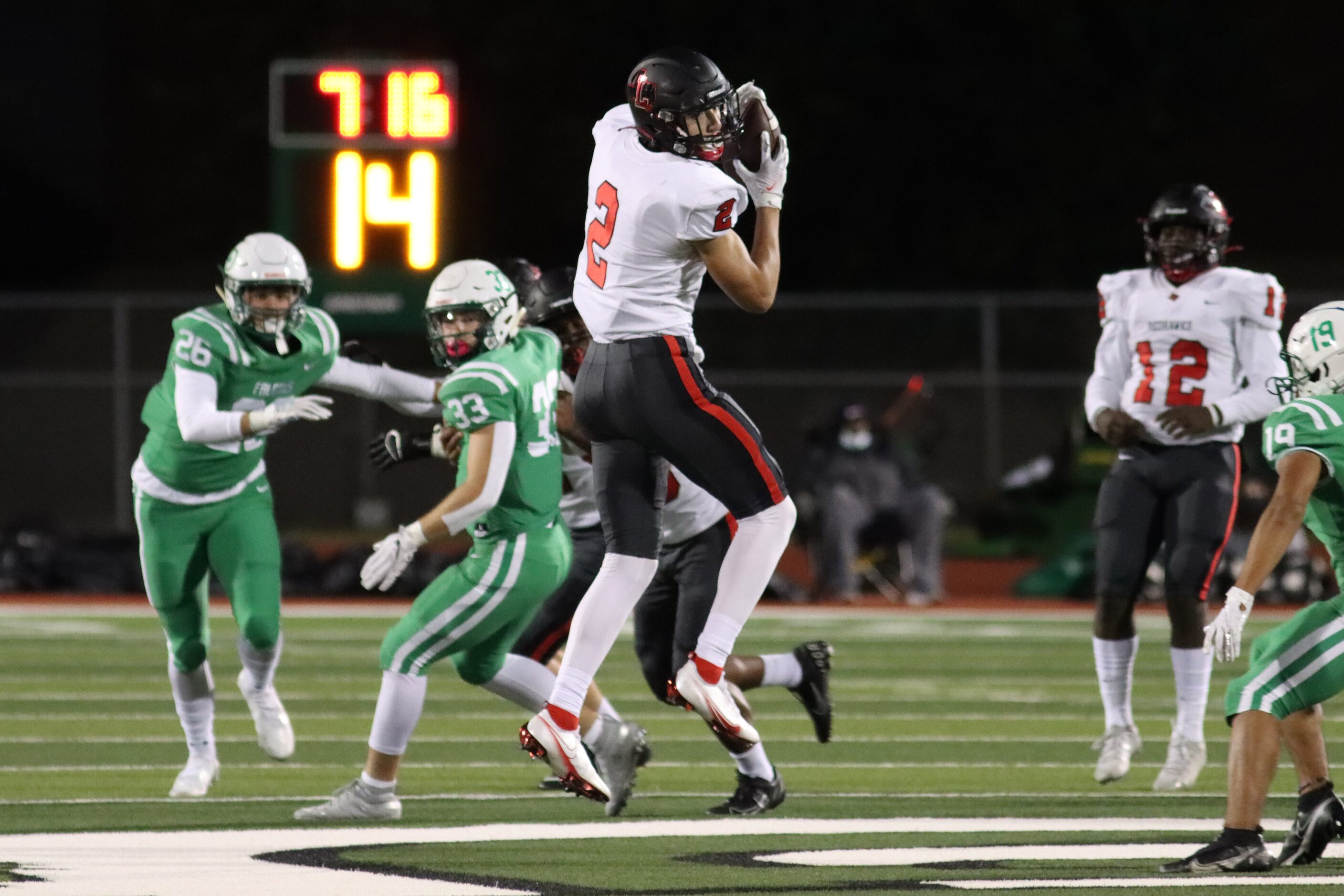 Frisco Liberty wide receiver Connor Hulstein (5) makes a catch during the first half against...