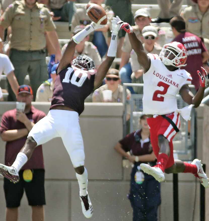 FILE - Texas A&M defensive back Myles Jones (10) breaks up a second-quarter pass intended...