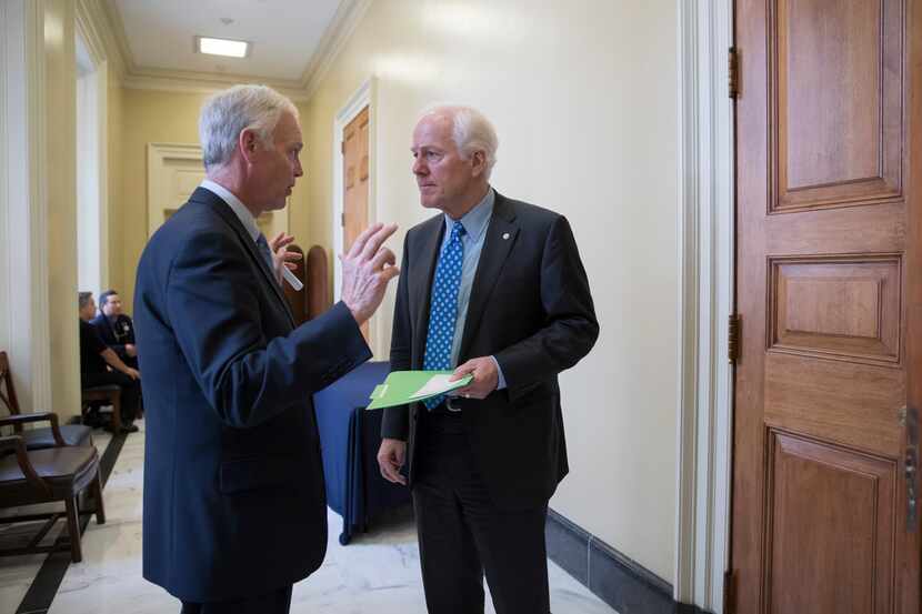 Sen. Ron Johnson, R-Wis., (left) chairman of the Senate Homeland Security and Governmental...