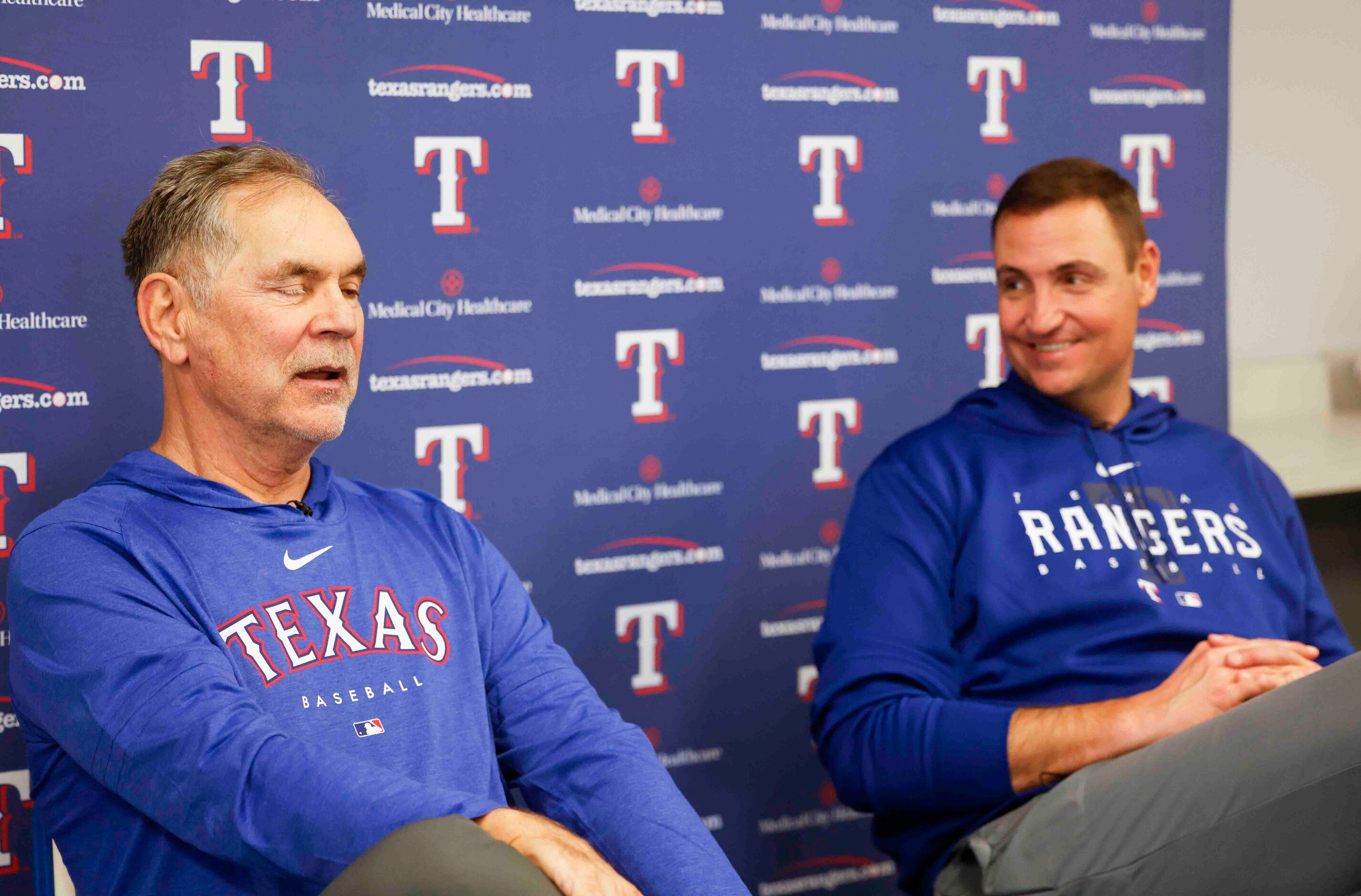 Texas Rangers manager Bruce Bochy, left, and executive vice president and general manager...