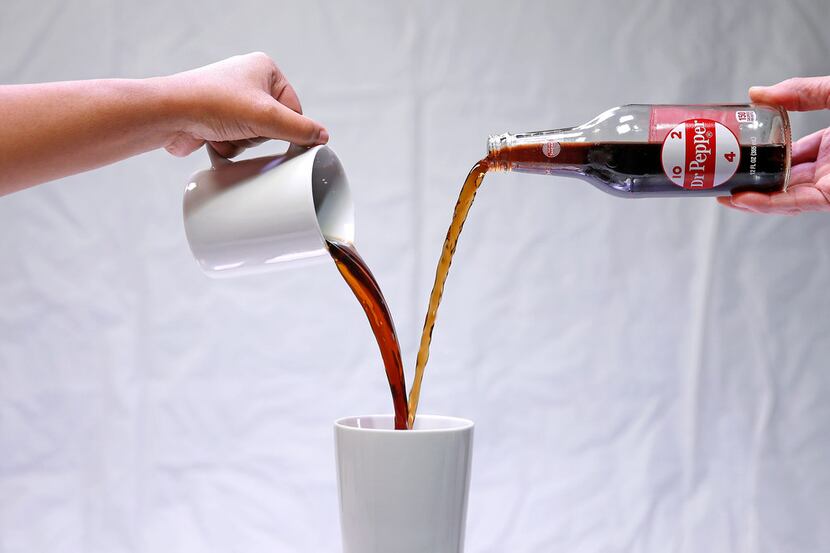 Dr Pepper is served in a mug.