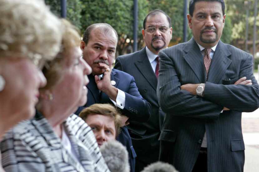 Luis de la Garza (right) was active in immigrant rights issues in Farmers Branch, where he...