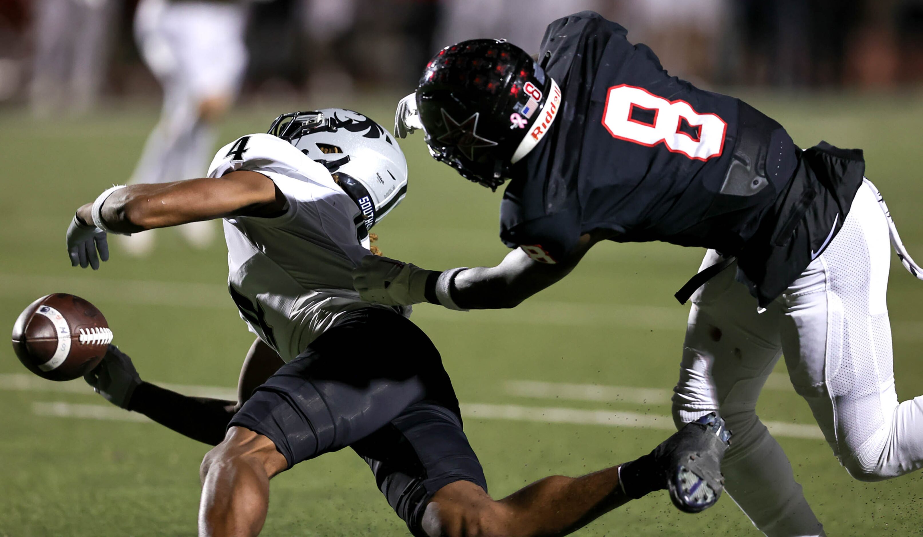 Denton Guyer wide receiver Josiah Martn (4) tries to come up with a reception against...