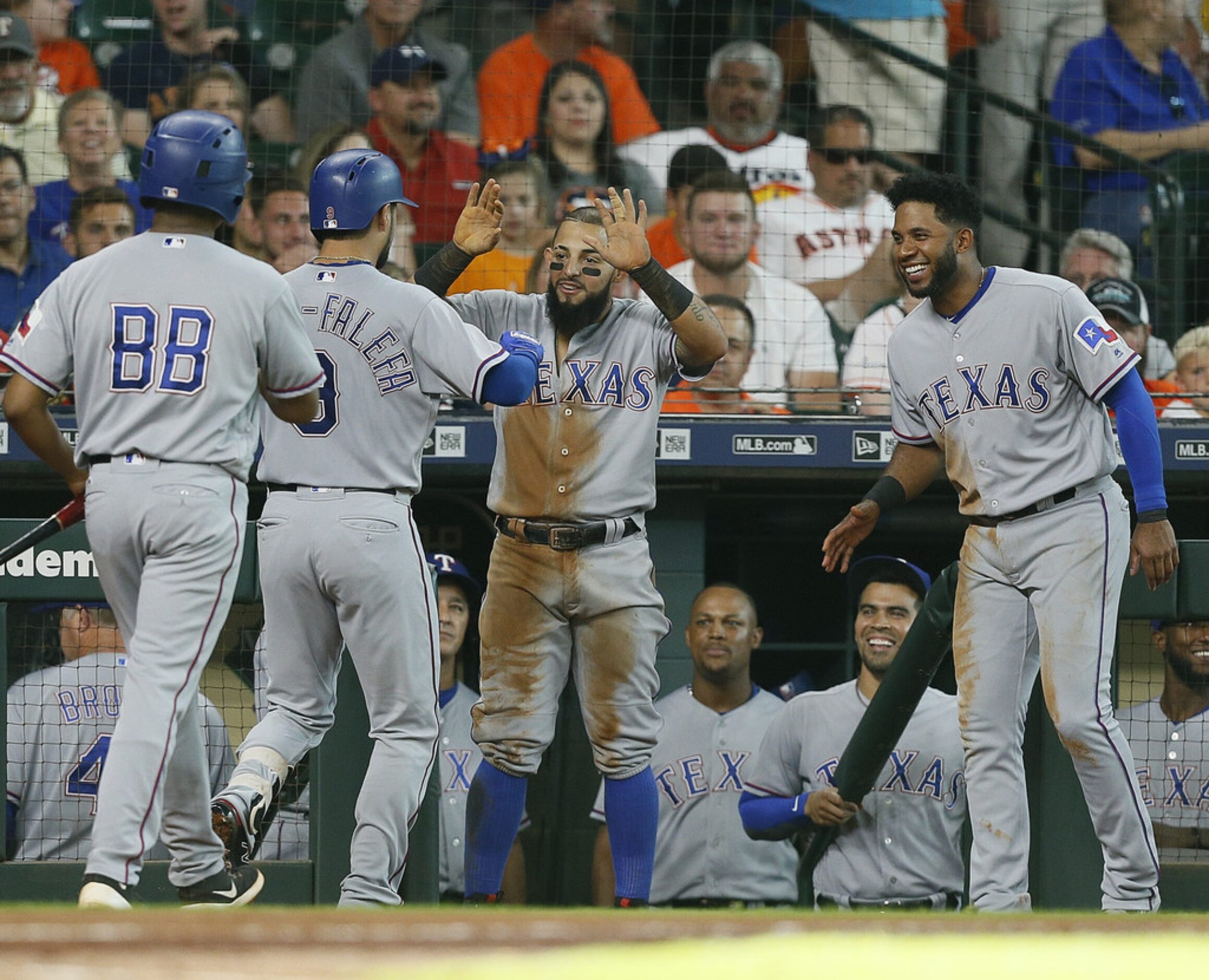 HOUSTON, TX - JULY 28:  Isiah Kiner-Falefa #9 of the Texas Rangers is congratulated by...