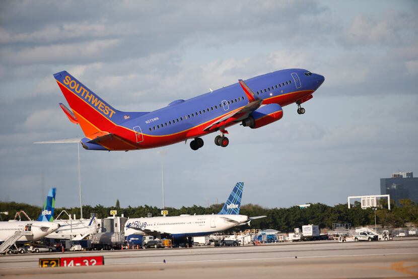 A Southwest Airlines boeing 737 takes off from Palm Beach International Airport in West Palm...