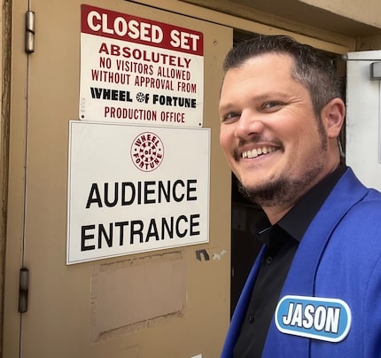 Jason White of Fort Worth stands outside the doors of the Sony Pictures Studios set in...