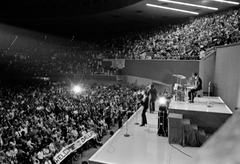 The Beatles perform at the Memorial Coliseum in Dallas, on Sept. 18, 1964, on their second...