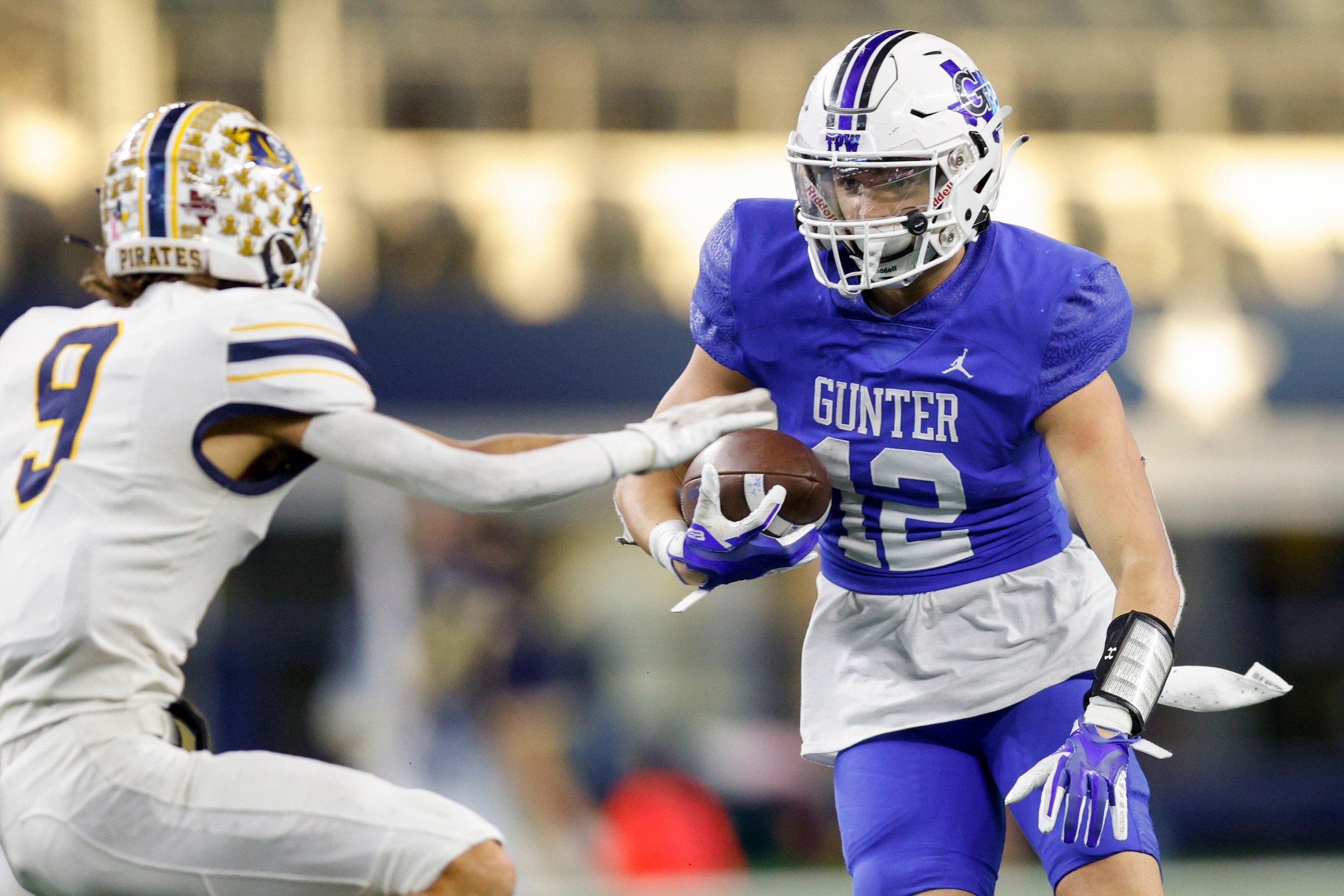 Gunter running back Ivy Hellman (12) cuts around Poth Seth Drzymala (9) during the second...