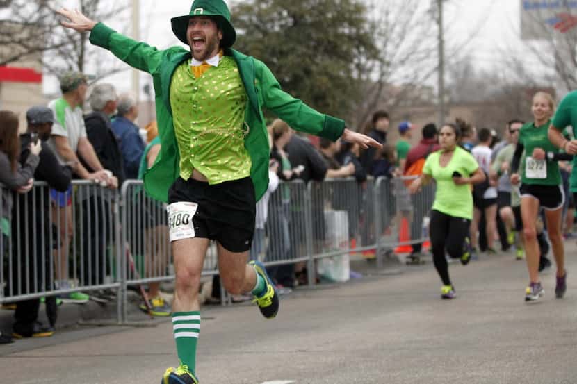 Matthew Kingore (3480) runs the final stretch during the St. Paddy's Day Dash Down...