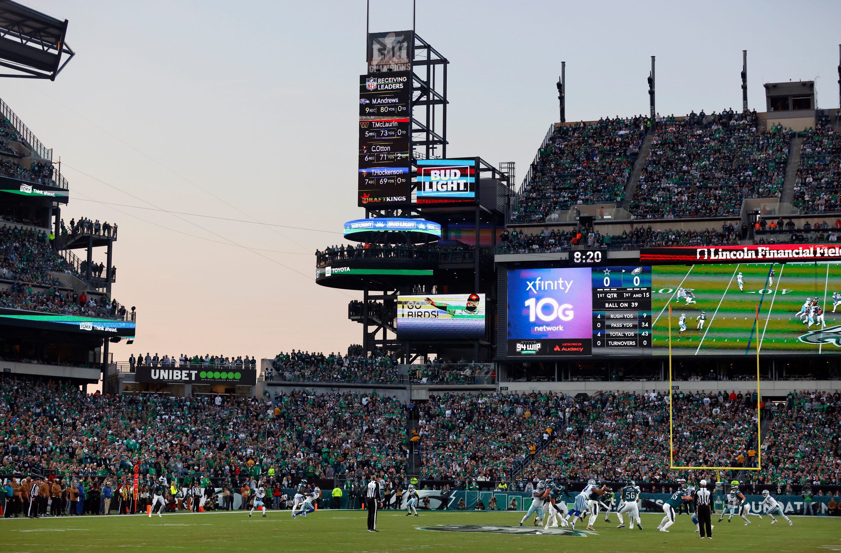 Philadelphia Eagles quarterback Jalen Hurts (1) is sacked by Dallas Cowboys defensive end...