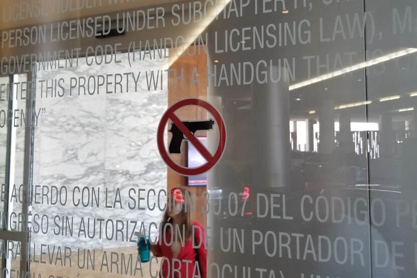 Legal notice at the entrance to the Grand Hyatt in downtown San Antonio, next to the Henry...