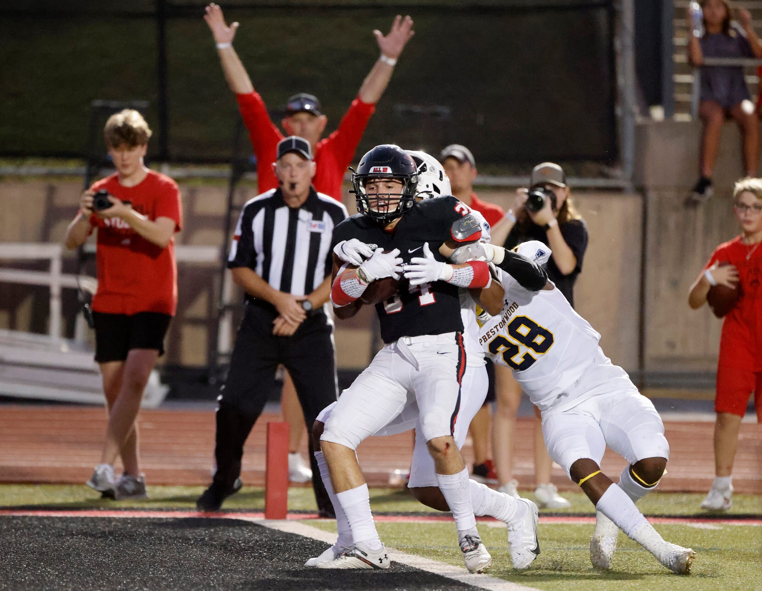 Coppell running back Blake Robbins (340 scores a touchdown against Prestonwood Christian...