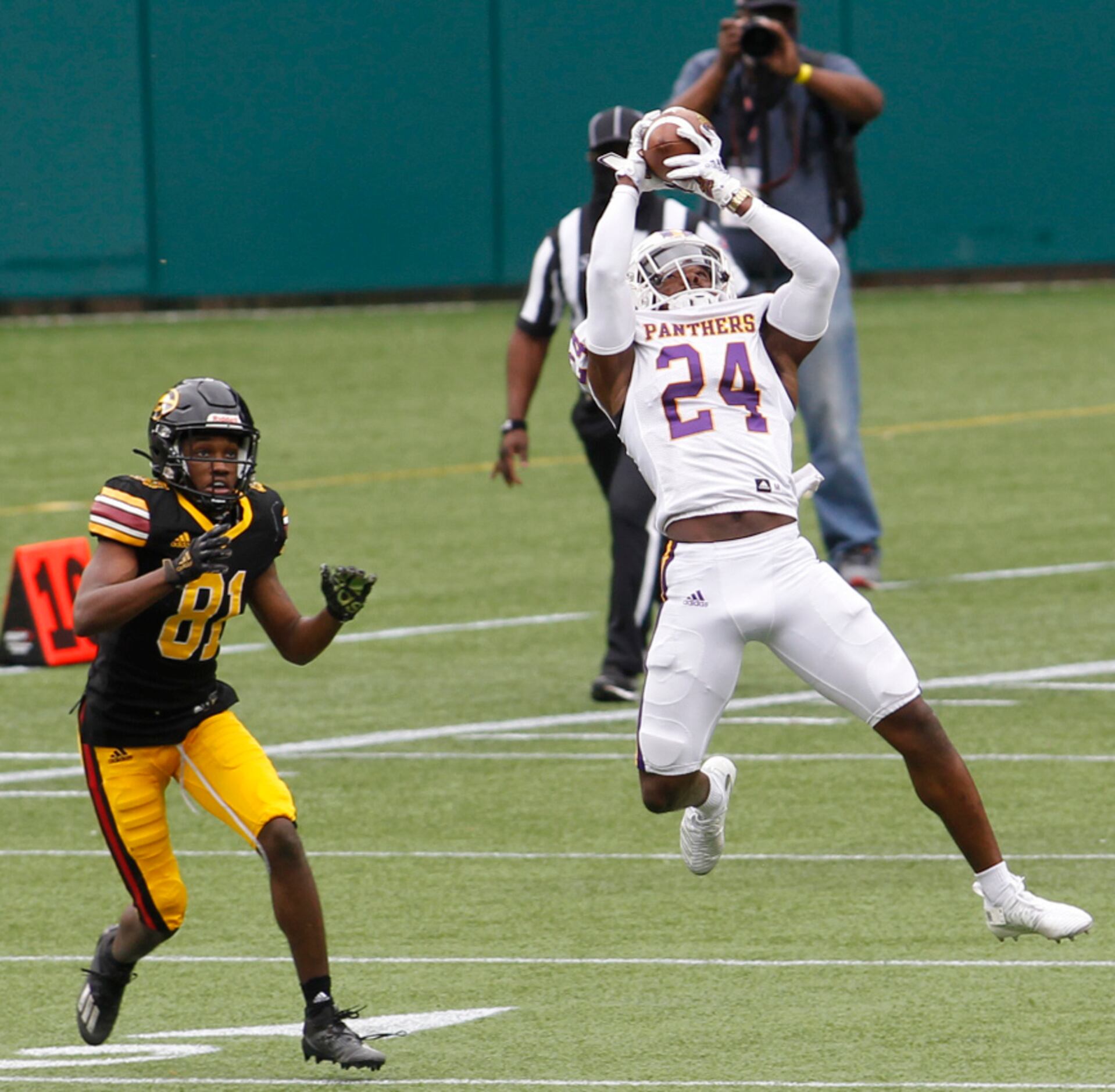 Prairie View A&M defender Reginald Stubblefield (24) leaps to intercept a pass intended for...