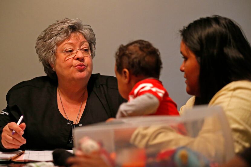 Suzanne Borman (left), a registered nurse with the WiNGS and Family-Nurse Partnership...