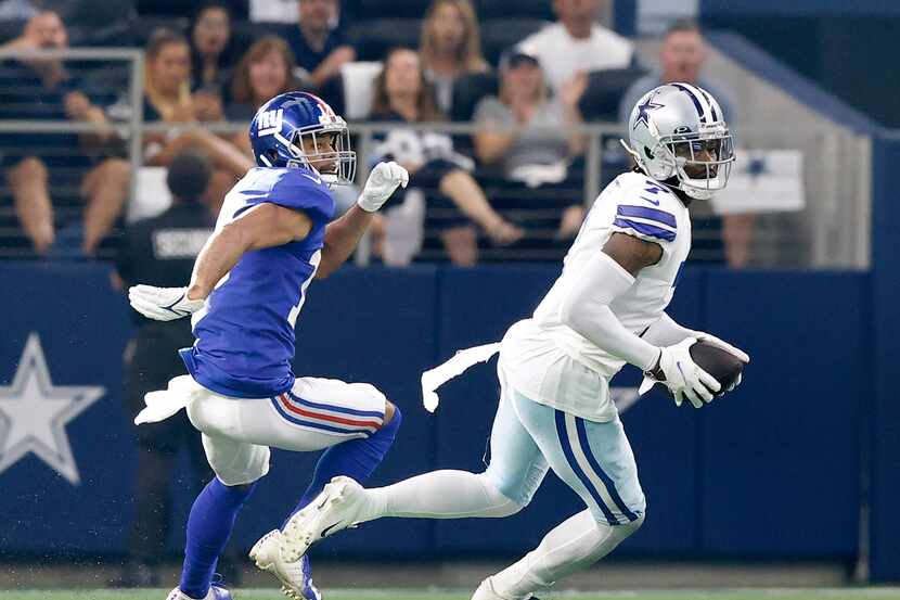 Dallas Cowboys cornerback Trevon Diggs (7) intercepts a pass intended for New York Giants...