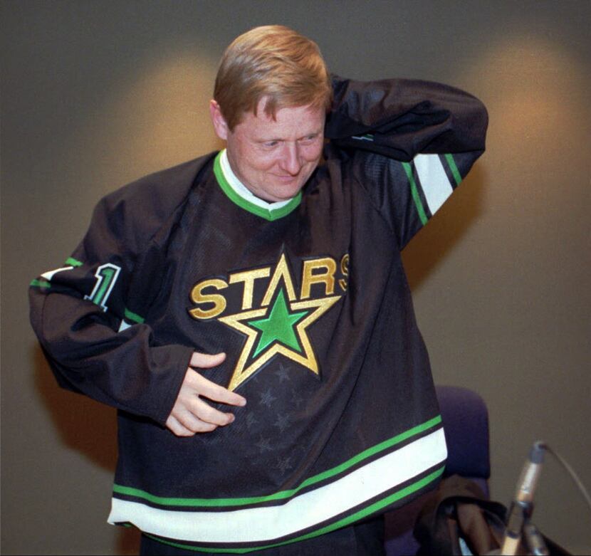 March 11, 1993 --Dallas Mayor Steve Bartlett dons a Dallas North Stars jersey in the city...