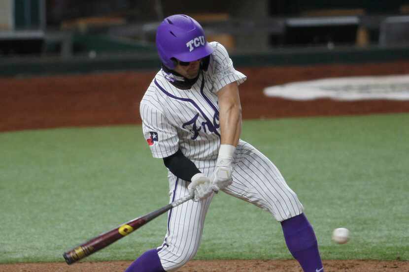 TCU center fielder Hunter Wolfe (6) is unable to connect or hold up on his swing as he is...