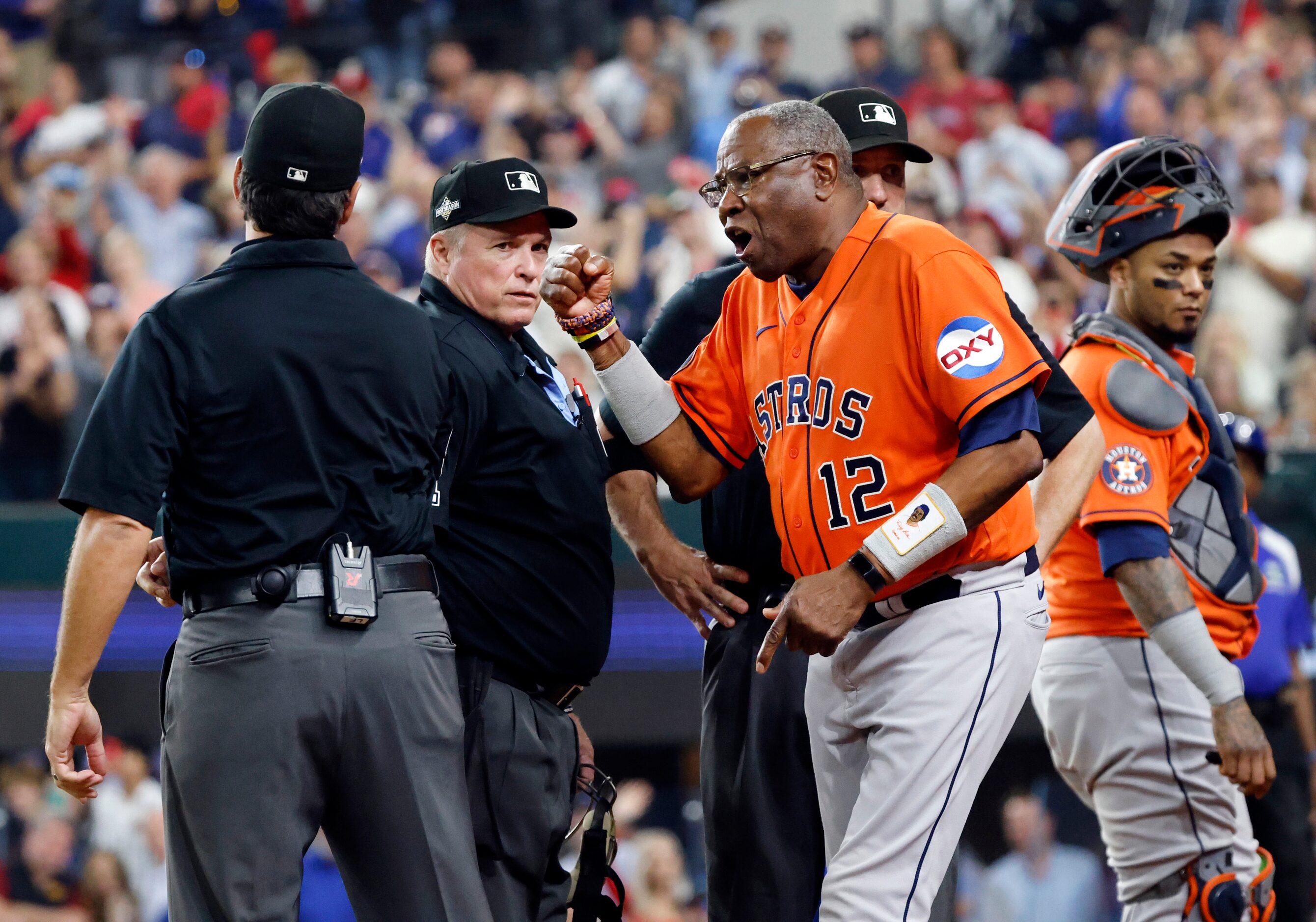 Houston Astros manager Dusty Baker argues with left field umpire James Hoye (left) after he...