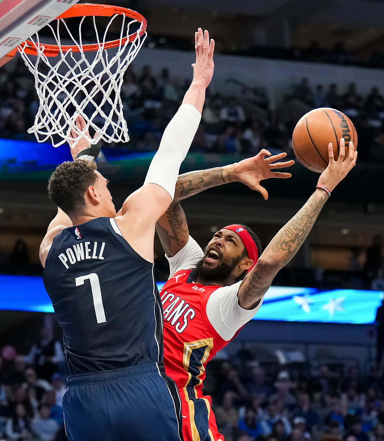 New Orleans Pelicans forward Larry Nance Jr. (22) drives to the basket against Dallas...