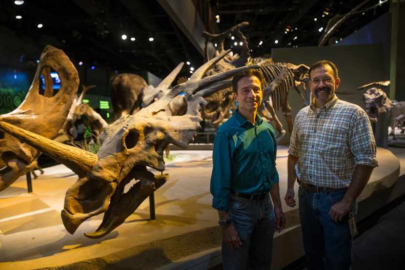 Paleontologists Tony Fiorillo (left) and Ron Tykoski attended the ribbon-cutting for the new...