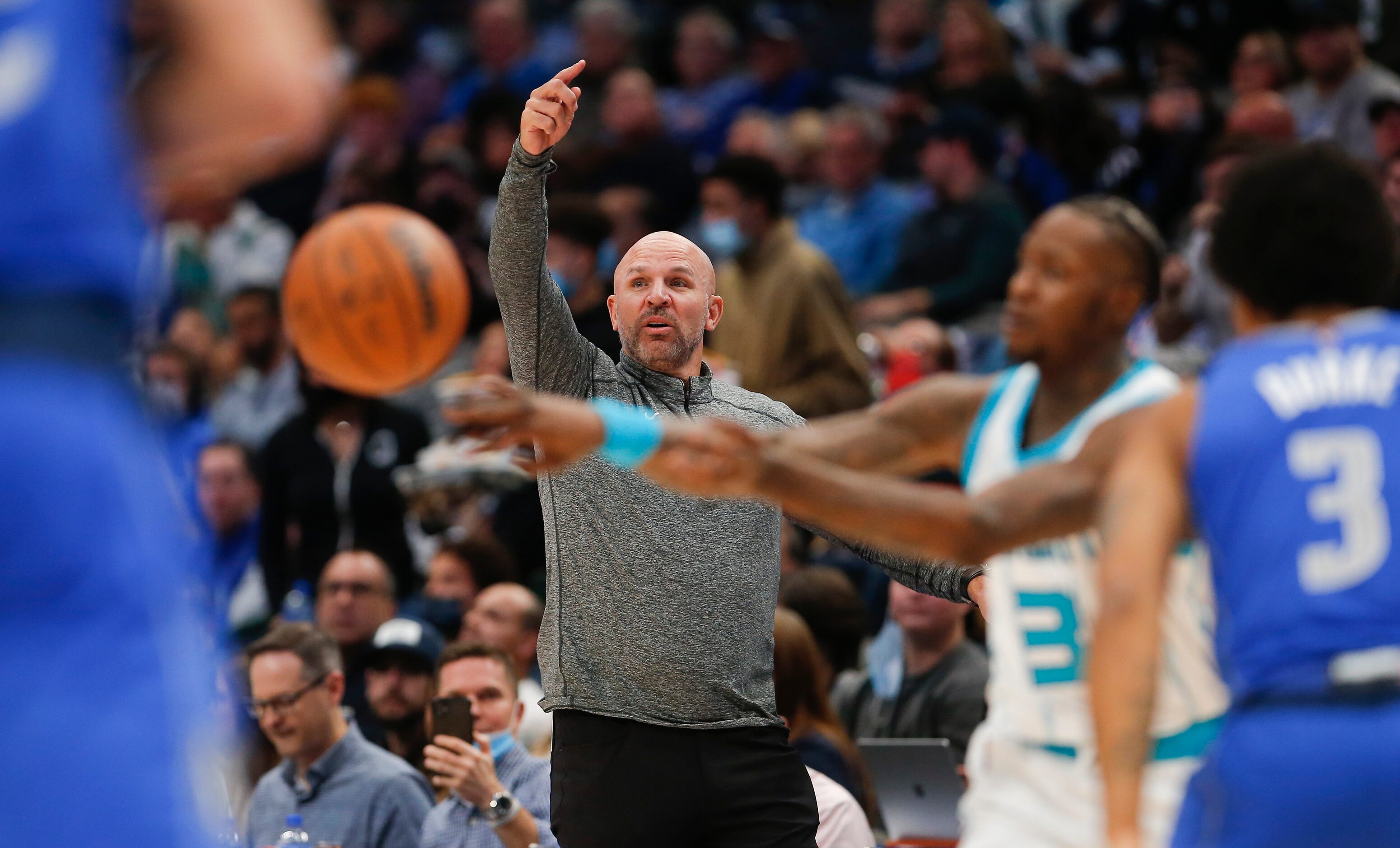 Dallas Mavericks head coach Jason Kidd shouts instructions to his players during the first...