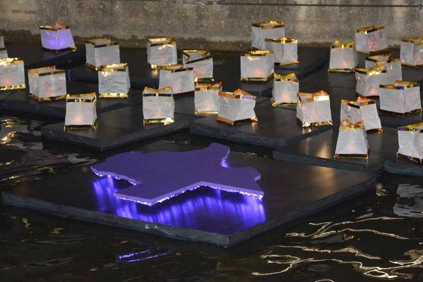 Lanterns that represent victims of domestic violence at an event along the Mandalay Canal in...