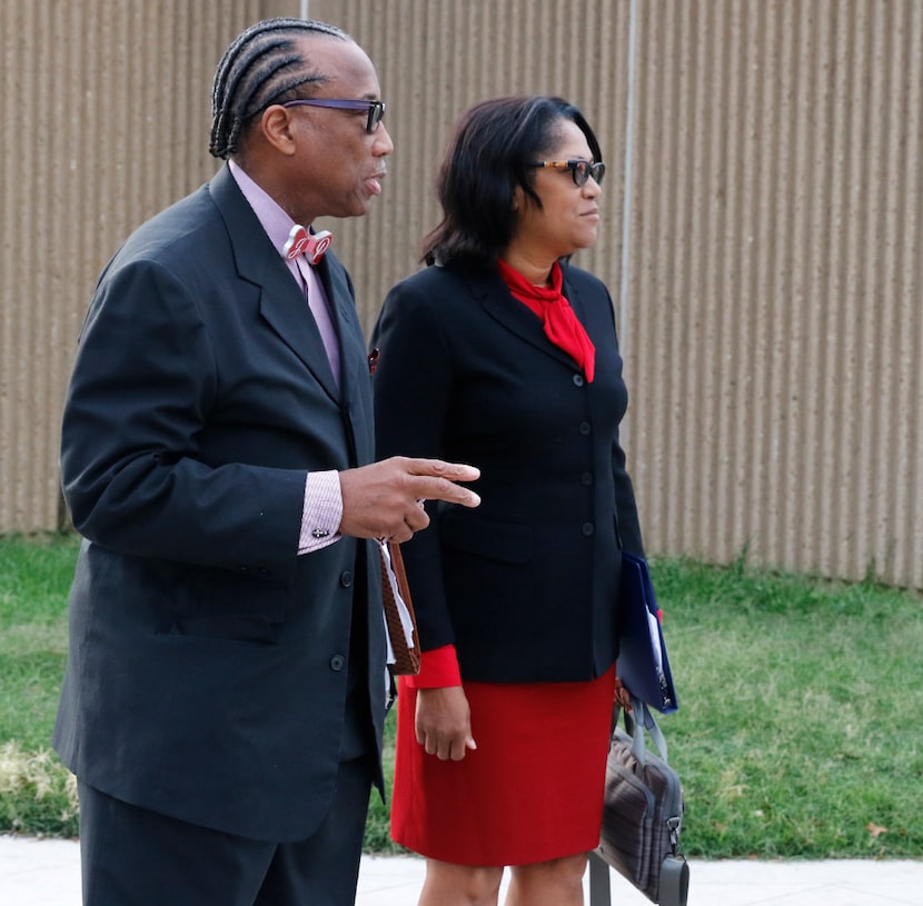 Dallas County Commissioner John Wiley Price, left, and co-defendant Dapheny Fain, wait to...