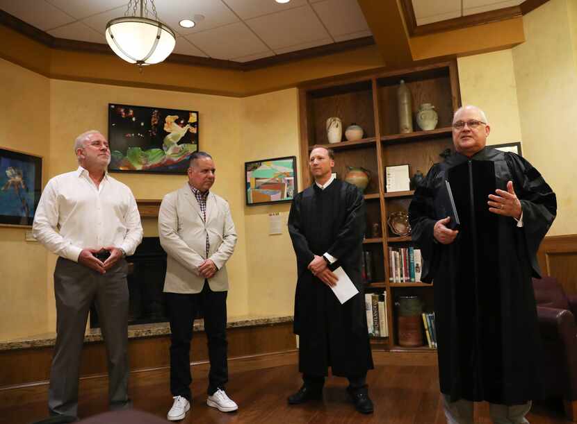 Jesuit College Preparatory School of Dallas president Mike Earsing (right) opened special...