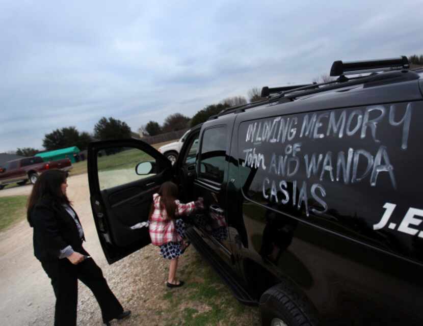Kathy Casias (left), the Casiases’ daughter-in-law, and her daughter get into their SUV that...