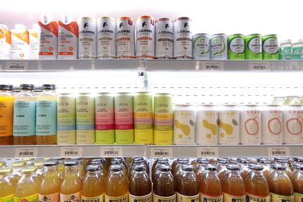 The beverage cases at Feed Me Pronto include non-alcoholic drinks (pictured here) as well as...