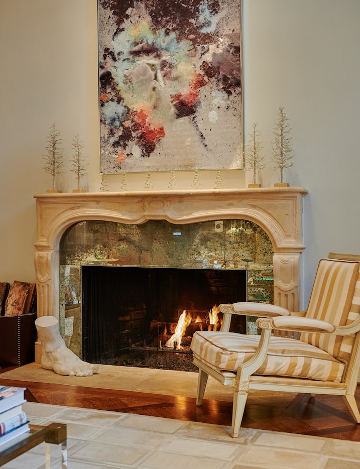 Showers' mantel showcases a collection of sparkly trees she sourced from Pottery Barn. "The...