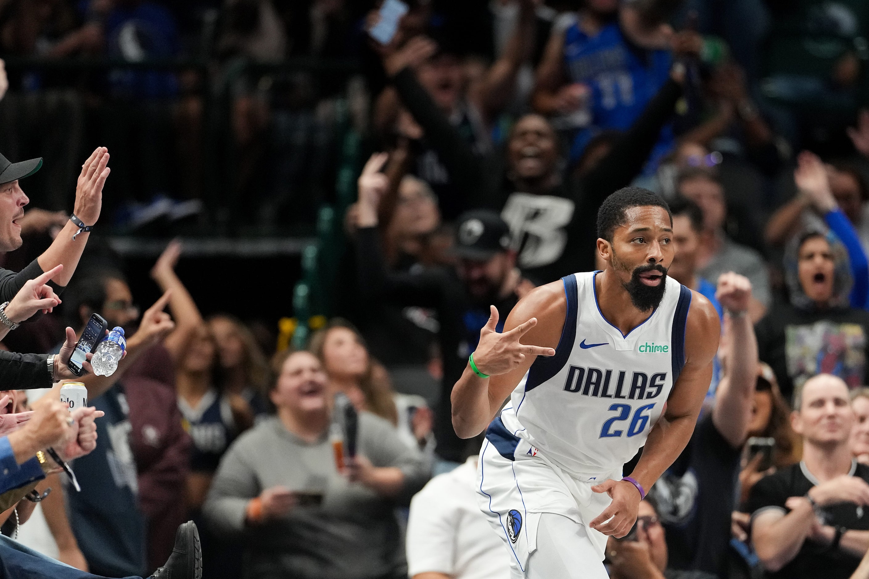 Dallas Mavericks guard Spencer Dinwiddie (26) celebrates after hitting a 3-pointer during...