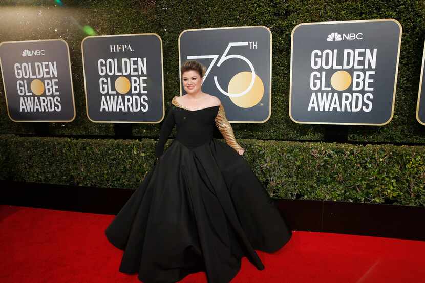 Kelly Clarkson arrives at the 75th Annual Golden Globes at the Beverly Hilton Hotel in...