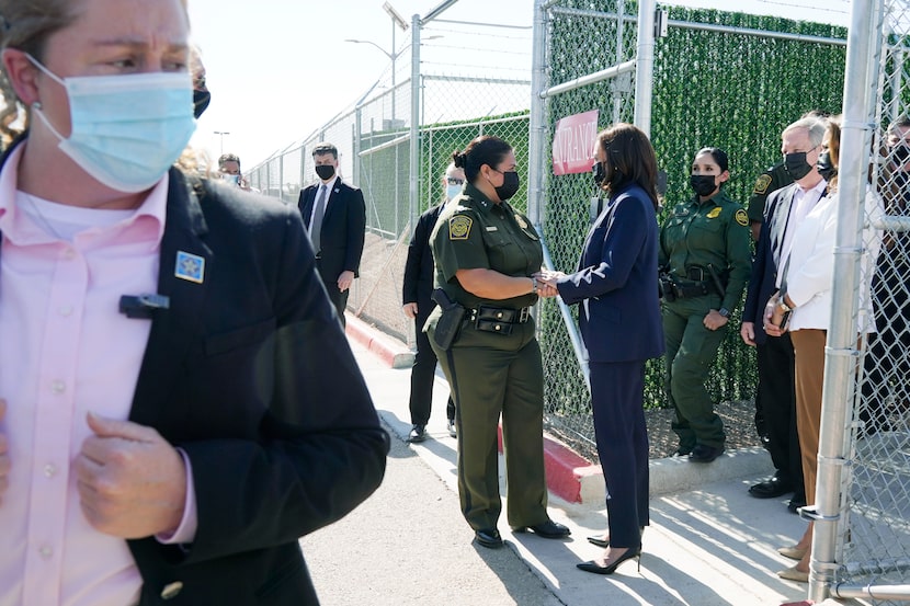 FILE - Vice President Kamala Harris talks to Gloria Chavez, chief patrol agent of the El...