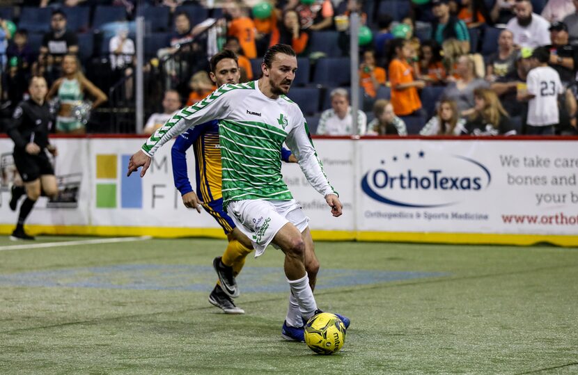 Cody Ellis of the Dallas Sidekicks dribbles against the San Diego Sockers.