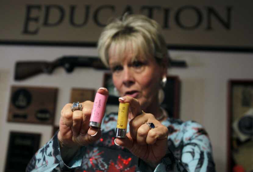 Almond shows off some of the merchandise. Pink shotgun shells. How cool is that?
