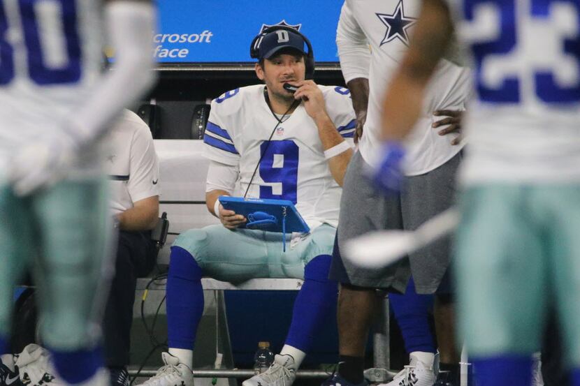 Dallas Cowboys quarterback Tony Romo (9) is pictured on the bench during the Tampa Bay...