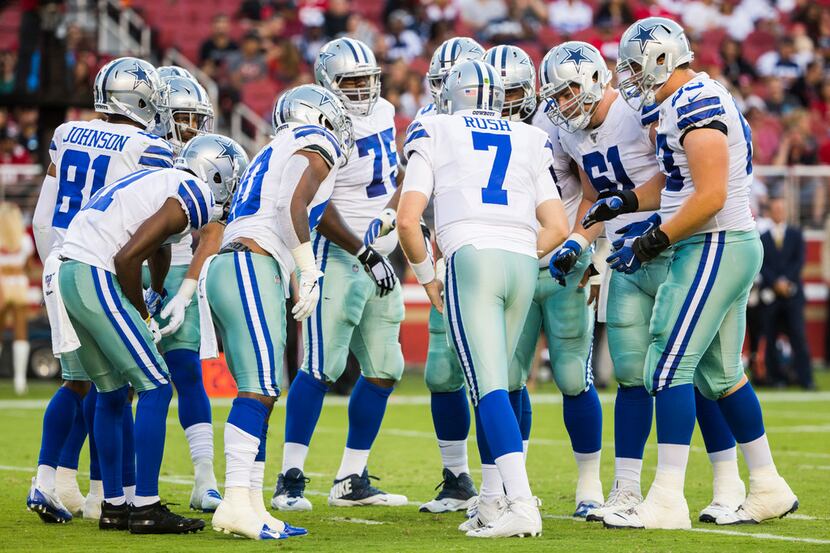 Dallas Cowboys quarterback Cooper Rush (7) calls a play during the second quarter of an NFL...