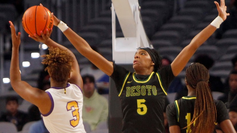 DeSoto senior Sa' Myah  Smith (5) defends a shot by Montverde forward Janiah Barker (3)...