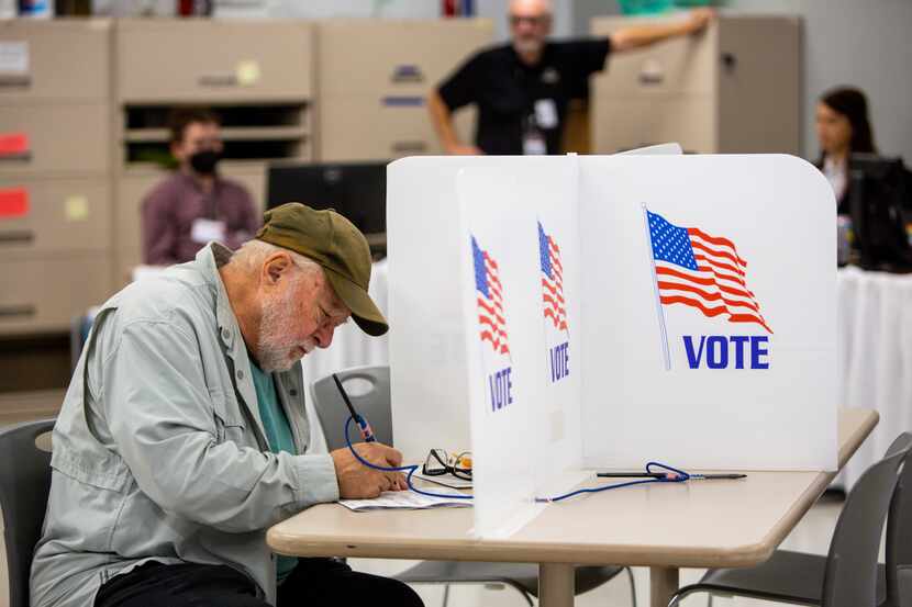 Voters cast their ballots on Friday, Sept. 23, 2022, in Minneapolis. With Election Day still...