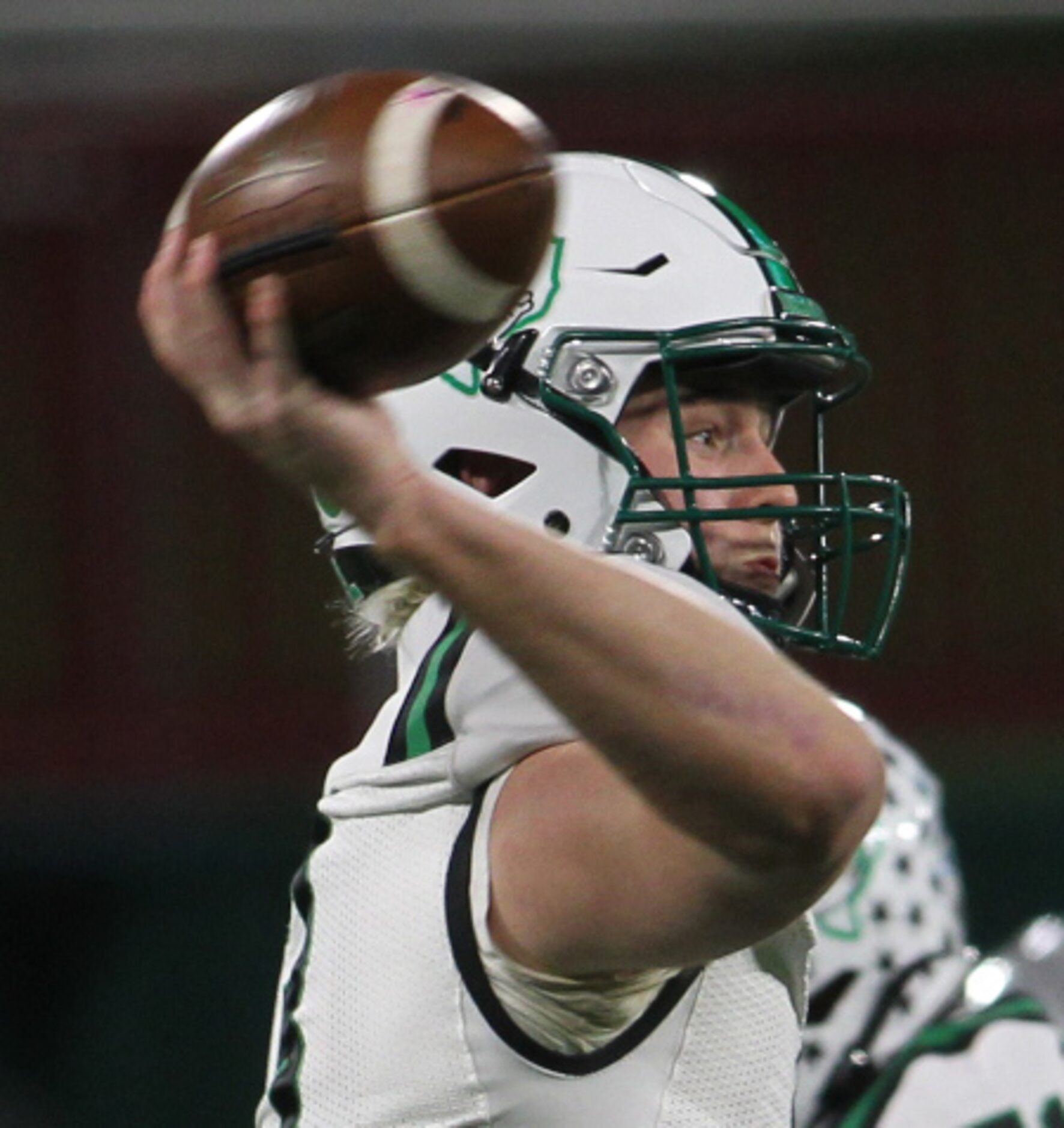 Southlake Carroll quarterback Quinn Ewers (3) launches a first quarter pass in their game...