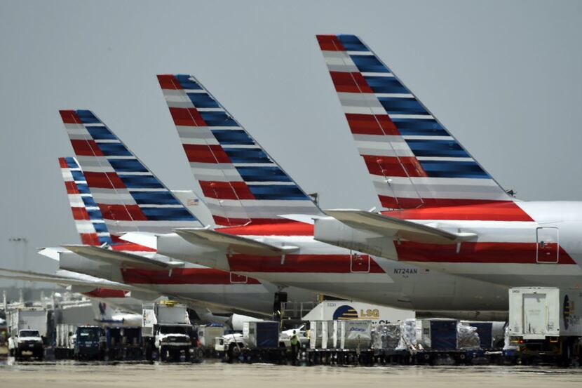 American Airlines planes at Dallas-Fort Worth Airport on July 1, 2014.  (Michael...